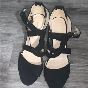 black heels with gold detailing